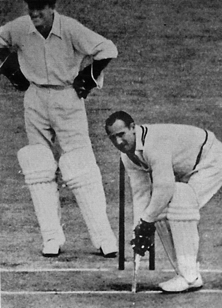 The joker in the Australian pack, Sid Barnes takes strike, Don Tallon is the amused wicketkeeper.