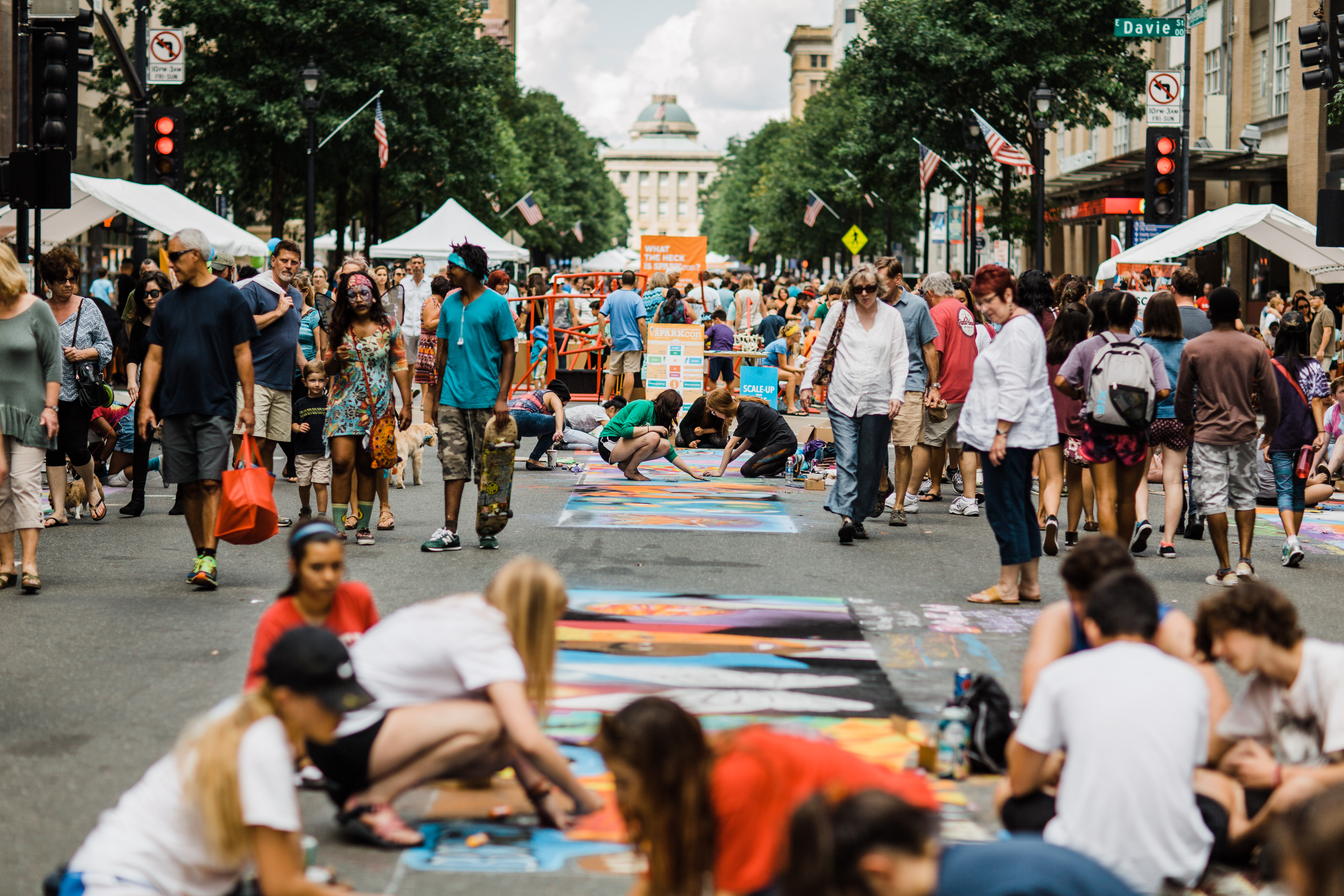 Chalk art lines Fayetteville Street as part of SPARKcon 2017.