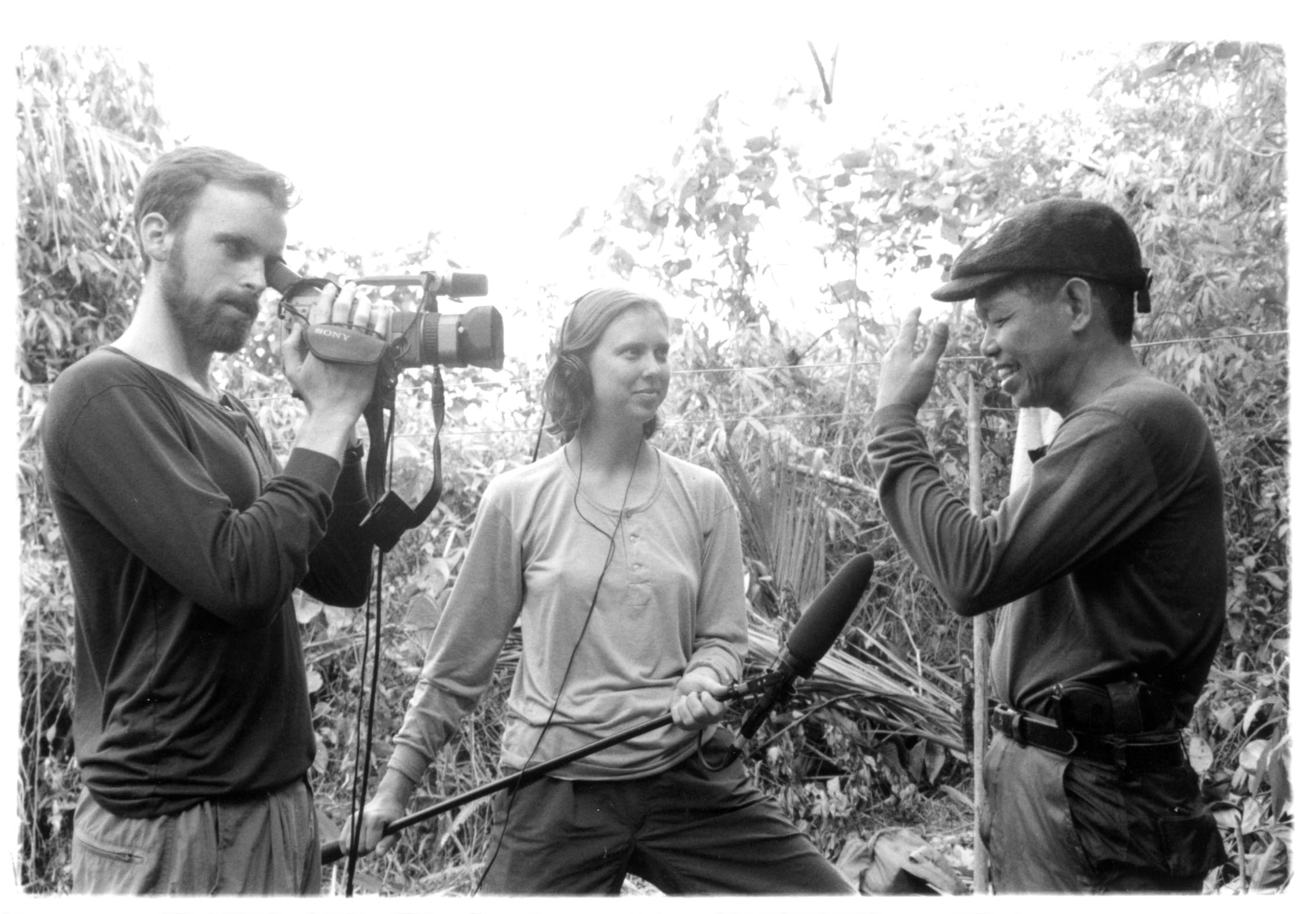 Matt Devries (left) and Schradie interview a villager in Hacienda Looc.
