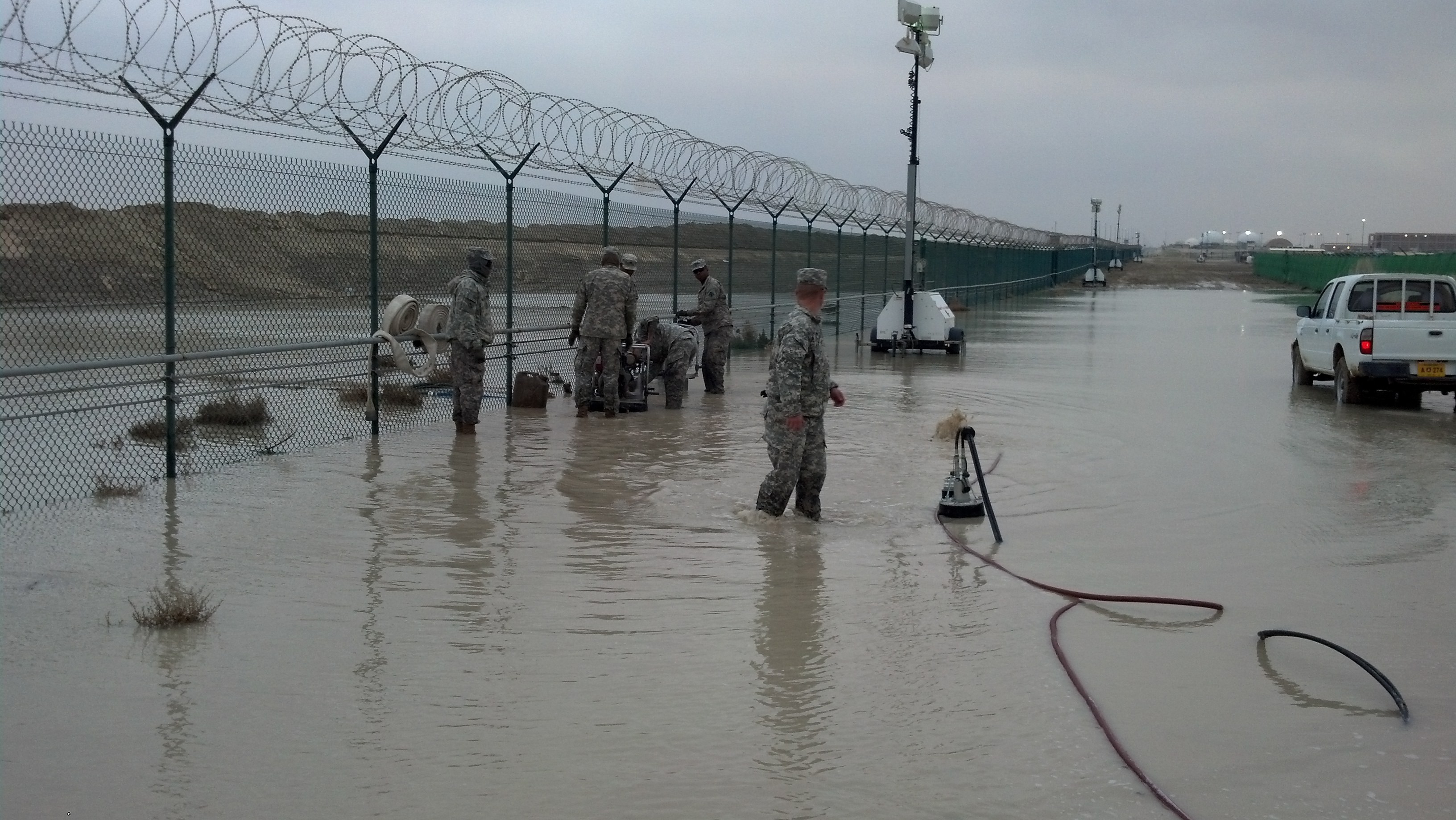 Floodwaters at Camp Arifjan, Kuwait, after a flash flood in November 2013.