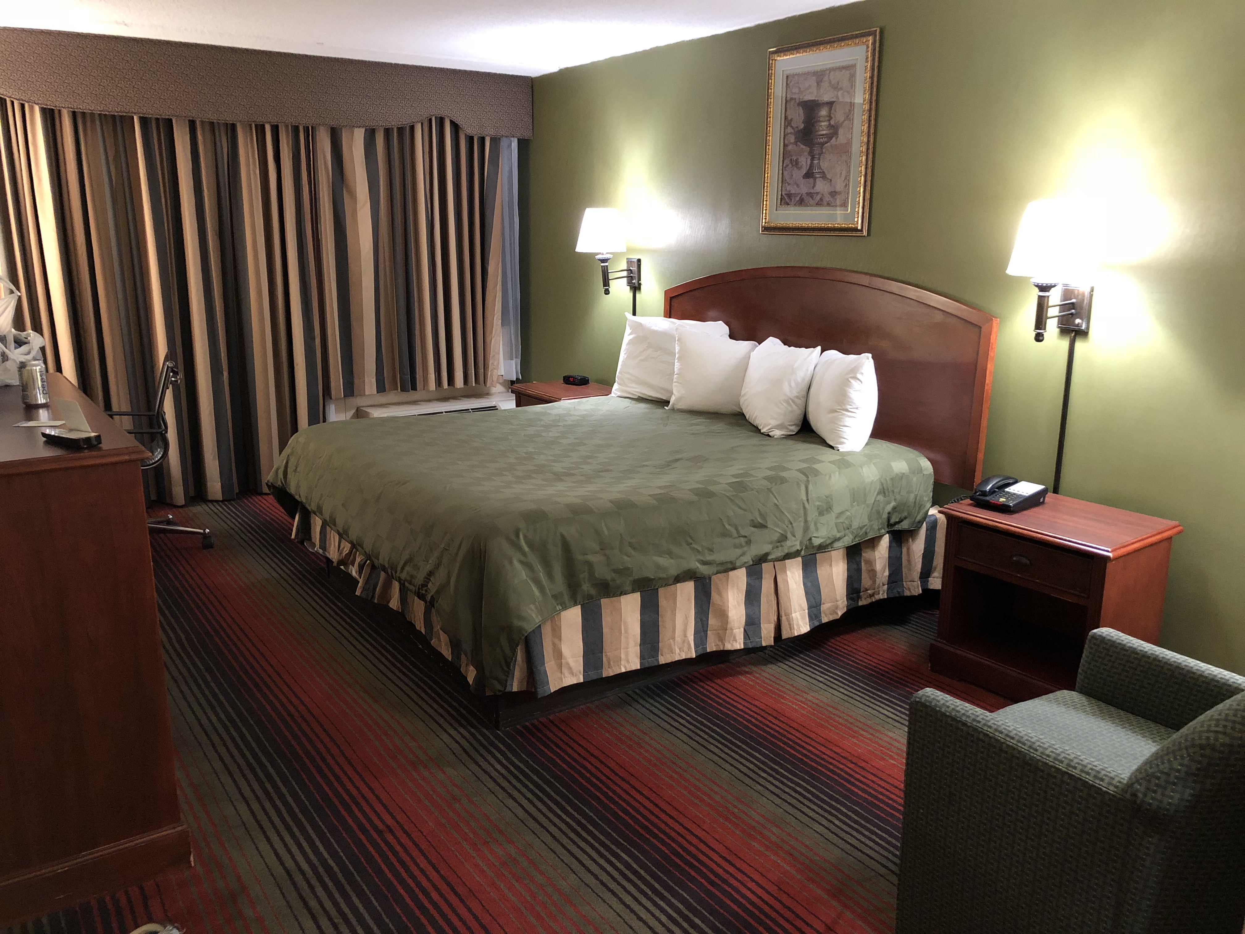 In hotel rooms, a solitary armchair facing the bed may be perceived as a cuck chair.