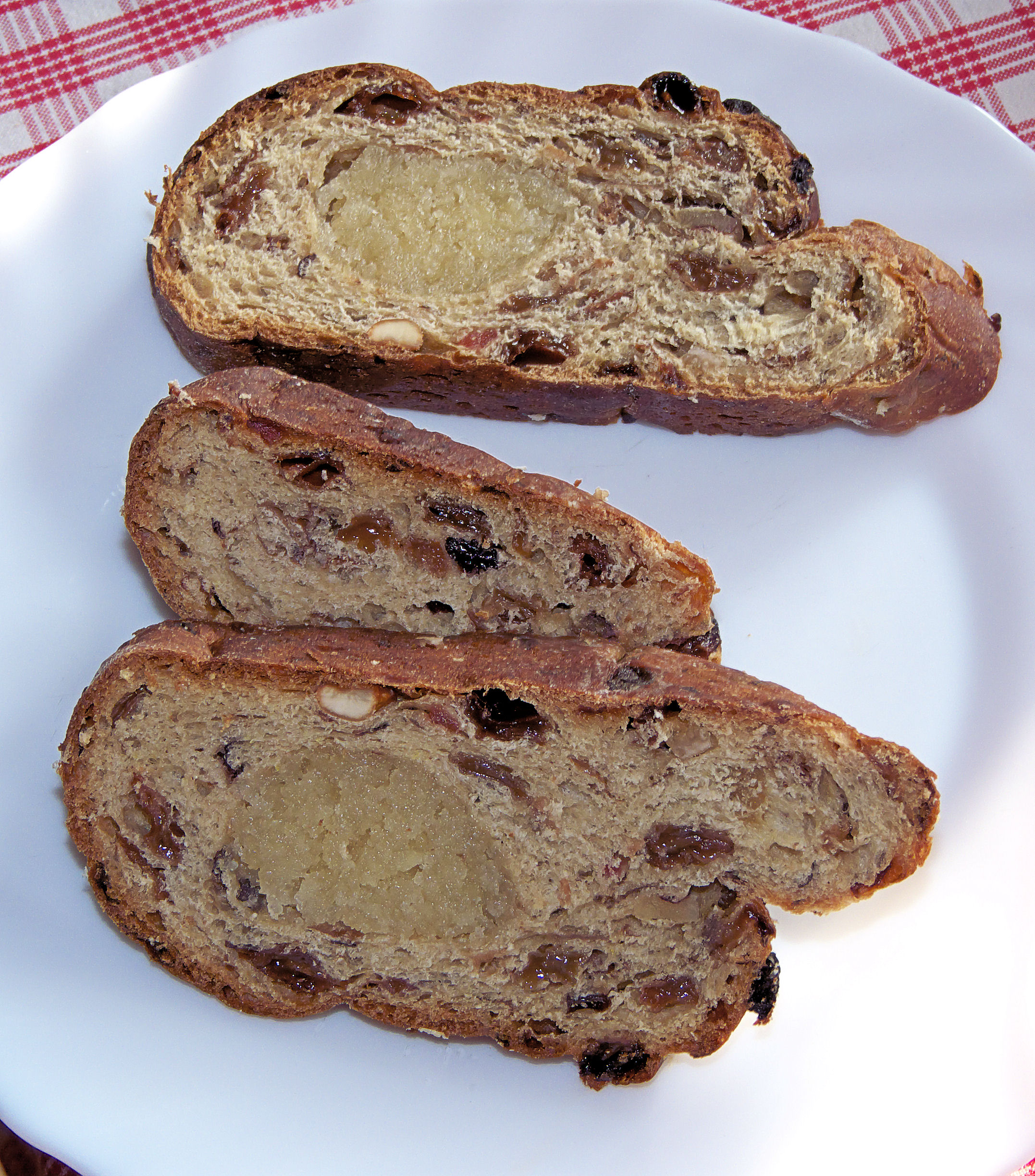 Kerststol slices with almond paste in the middle