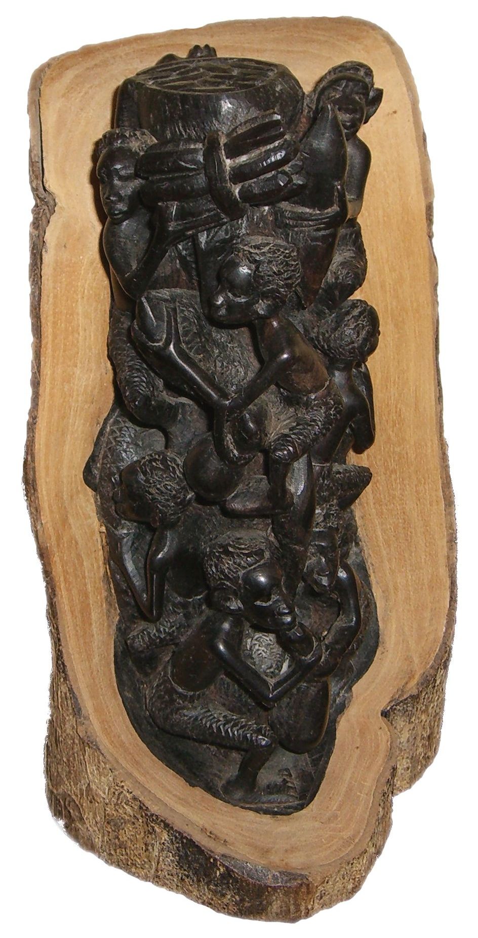 In this ebony sculpture, the artist has made use of the contrasting colors and textures in a single piece of wood.