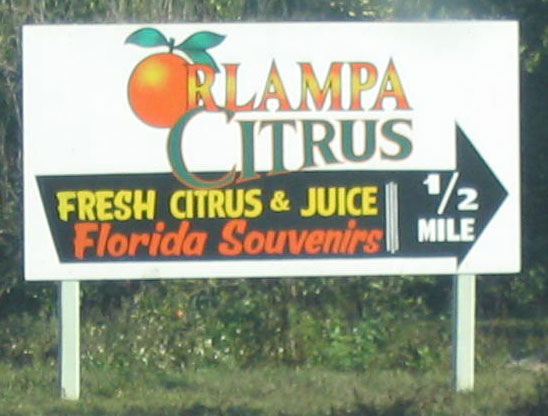 An advertisement for Orlampa Citrus