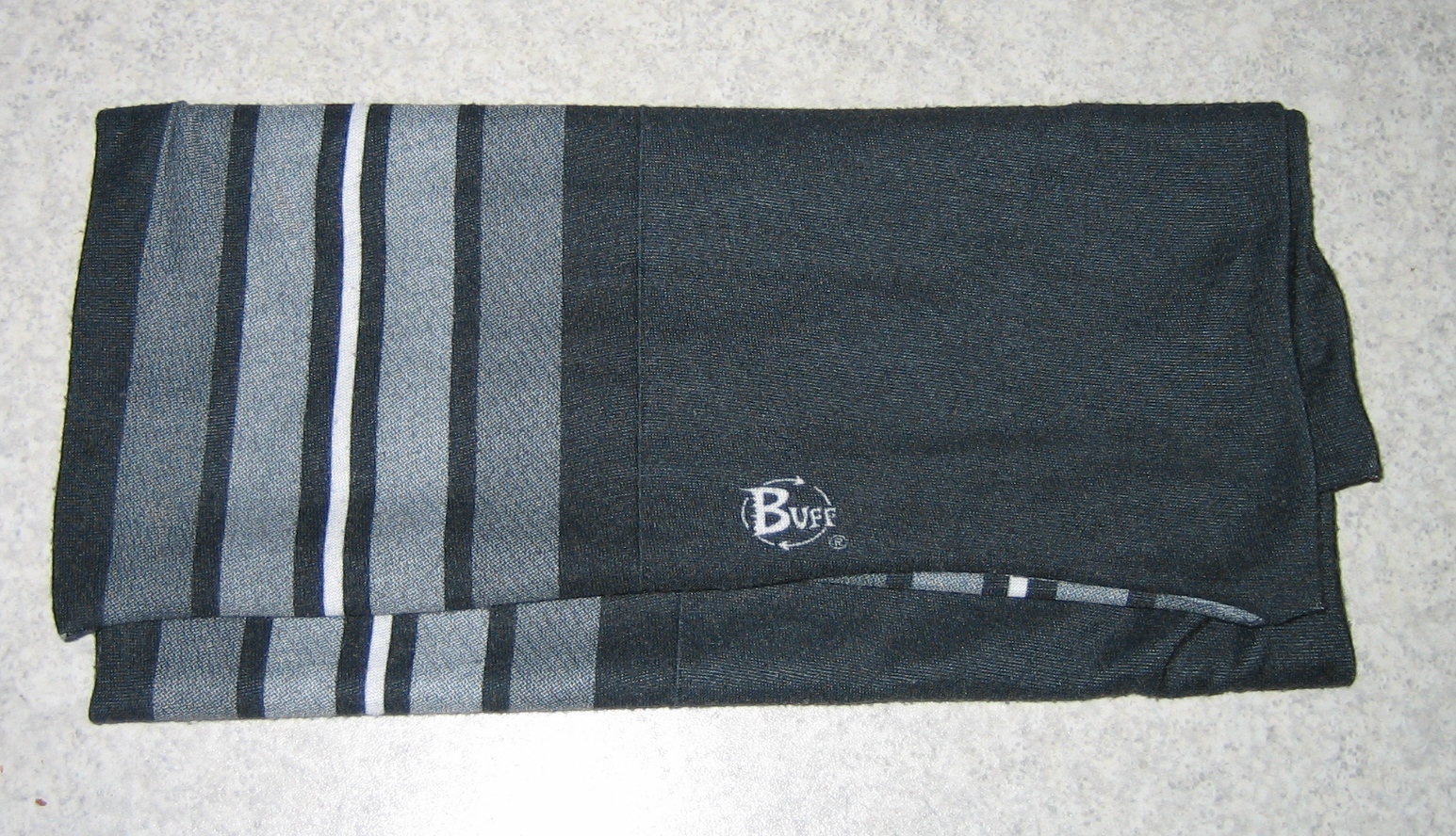 Folded Buff with logo on it
