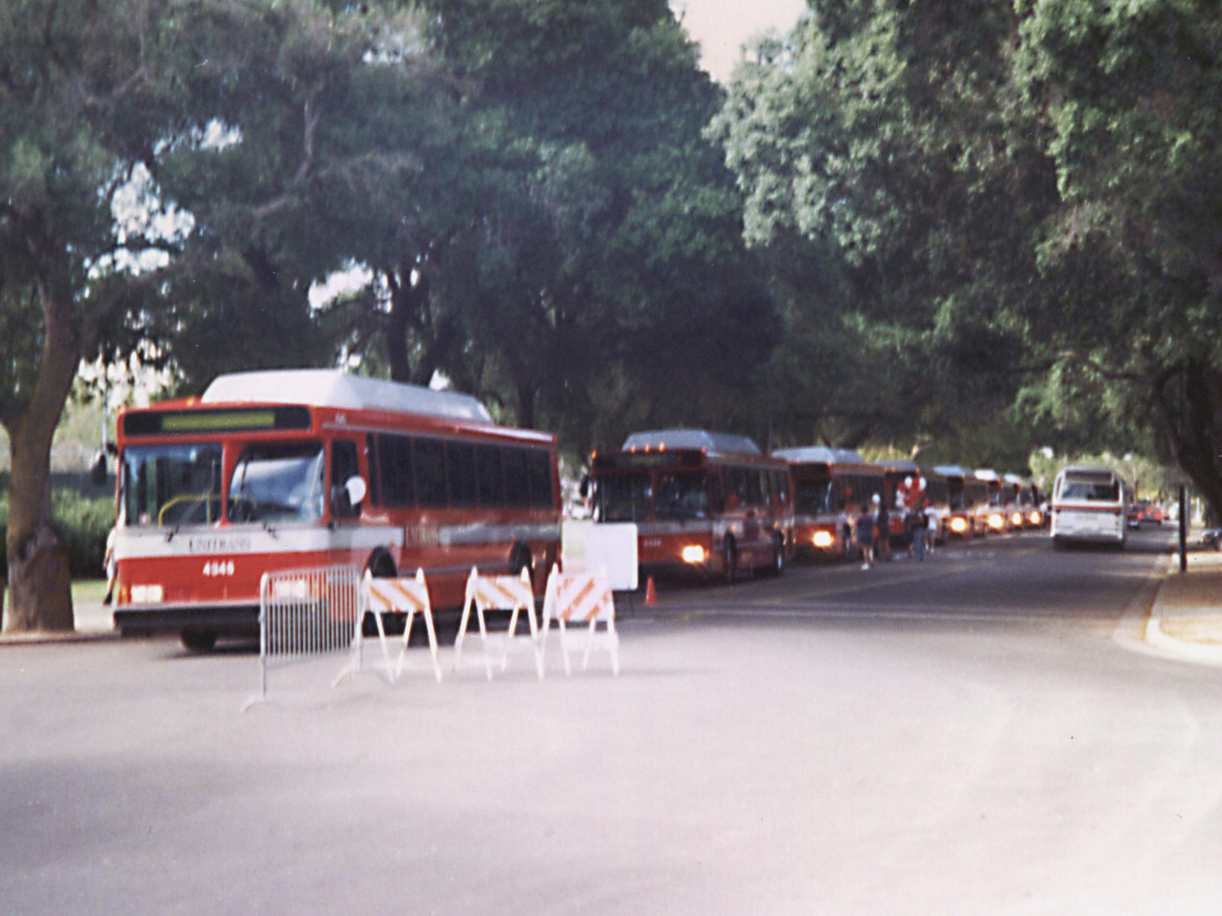 4349 and its fleetmates on Howard Way headed for their ribbon [...] ceremony at the MU Terminal (photo taken in 1996)