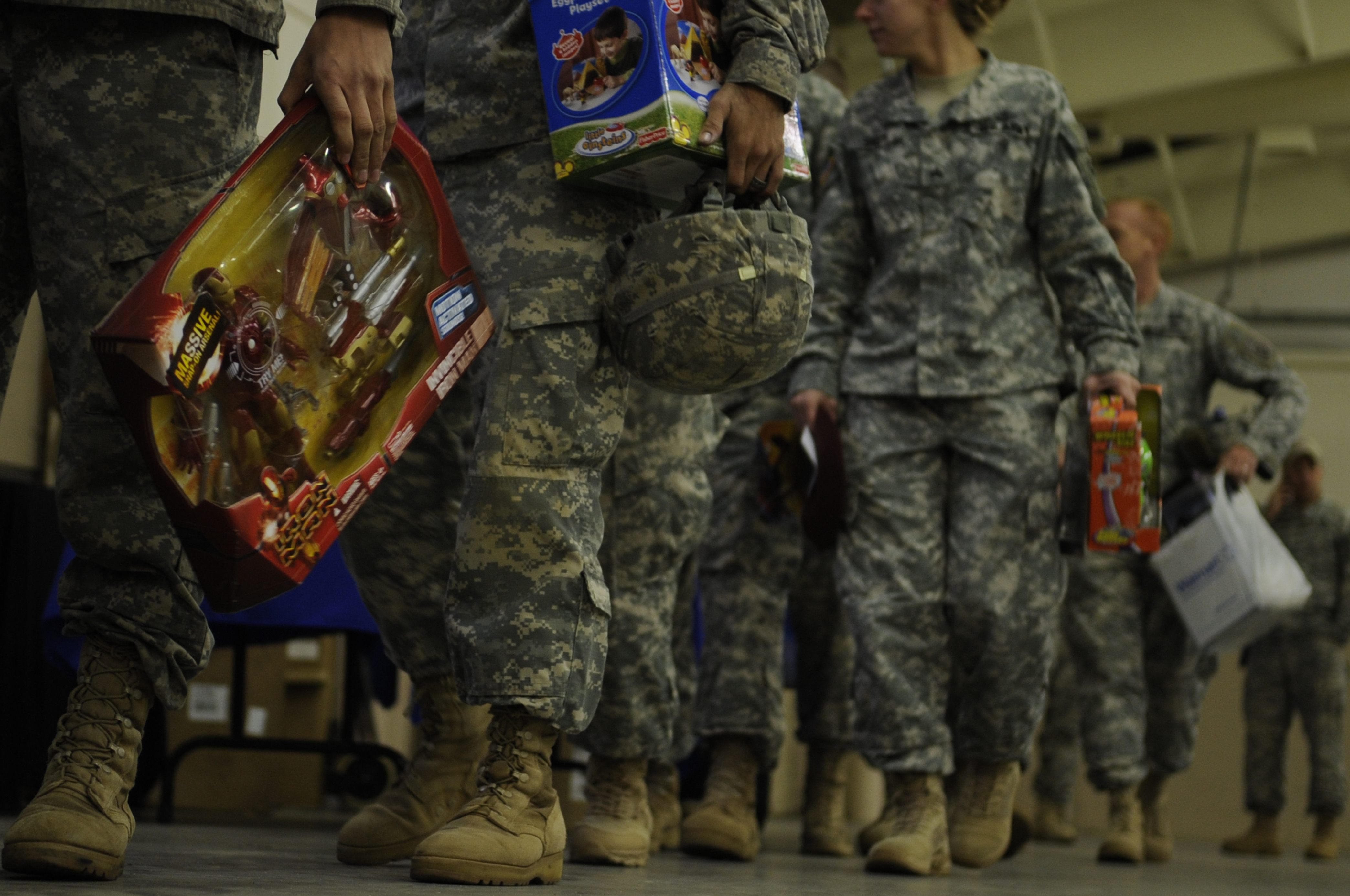 U.S. Soldiers from the 82nd Airborne Division, Fort Bragg, N.C., wait to donate a toy during Operation Toy Drop on Pope Air Force Base, N.C., Dec. 5, 2008. Operation Toy Drop is an annual airborne jump on Fort Bragg, North Carolina.