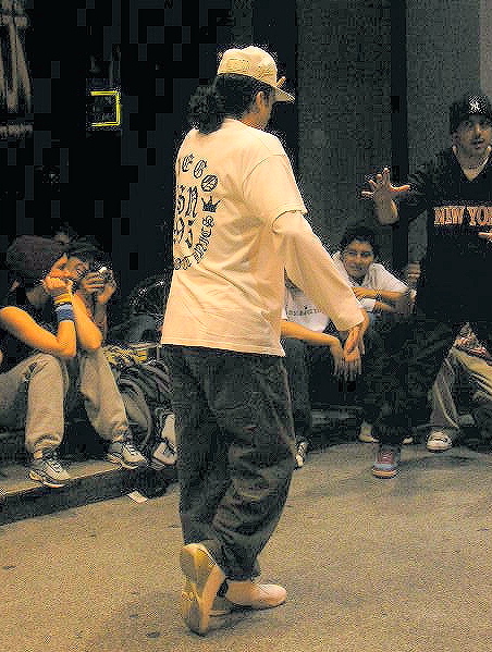 A dancer doing the moonwalk (backslide).