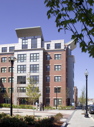Maverick Landing in East Boston, an example of HOPE VI public housing revitalization. This building employs photovoltaic roof panels to generate electric current.