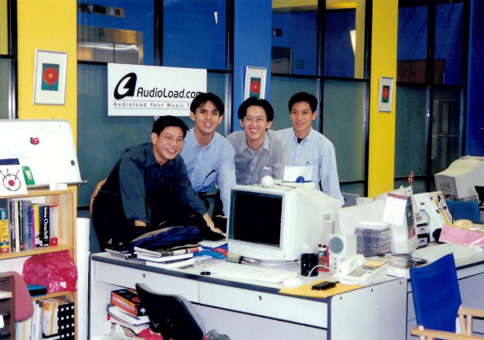The Audioload.com team at their office workspace.