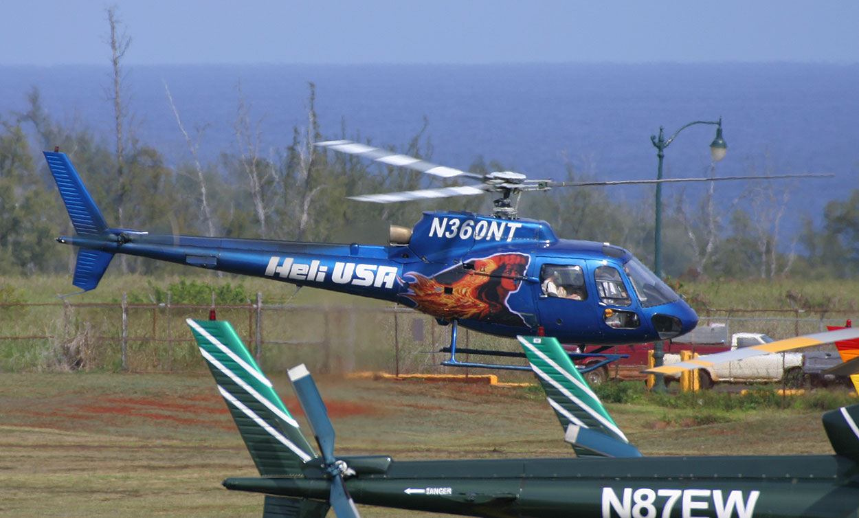 A Heli USA helicopter departs Lihue Airport in Hawaii