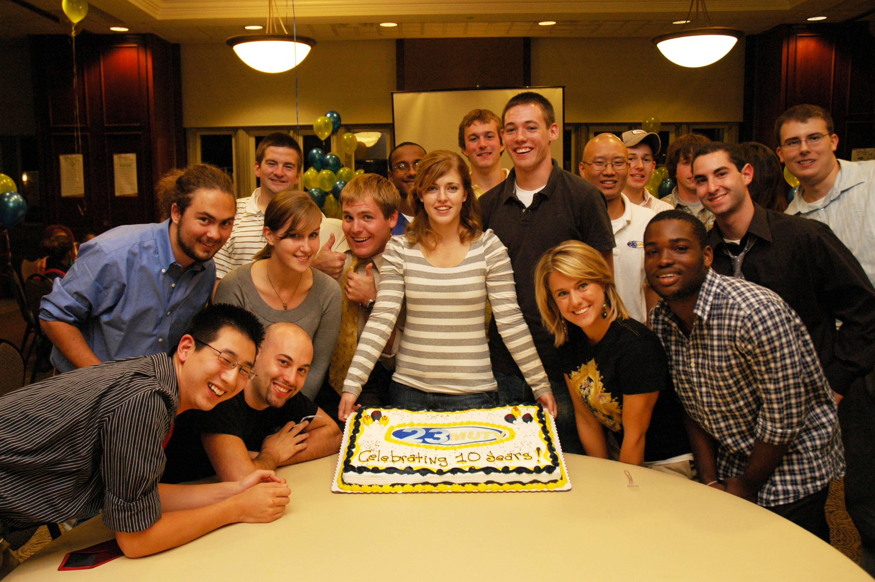 The MUTV Executive Board of Directors, Fall 2008: Front row 4 (L-R): Andrew Worrall, Gary Blase, Emily Cottingham, & Ipalibo "Marvel" Da-Wariboko. Middle row 7 (L-R): Sam Stella, Erin Stevenson, Neal Ford, Sarah Schultz, Paul Schwinn, Austin Kim, & Josh Frydman. Back row 7 (L-R): Andrew Patchell, Wayne Martino, Charlie Aufmann, Erik Shute, Matt Maxon, Taylor Mauk (obscured), & Nick Balogh.