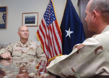 JTF-GTMO Commandant Mark Buzby discusses the death of Abdul Razzaq Hekmati with chief doctor Captain Bruce Meneley.