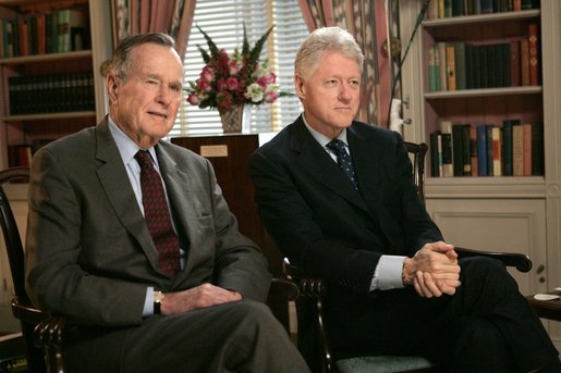 Presidents George H. W. Bush and Bill Clinton in January 2005.