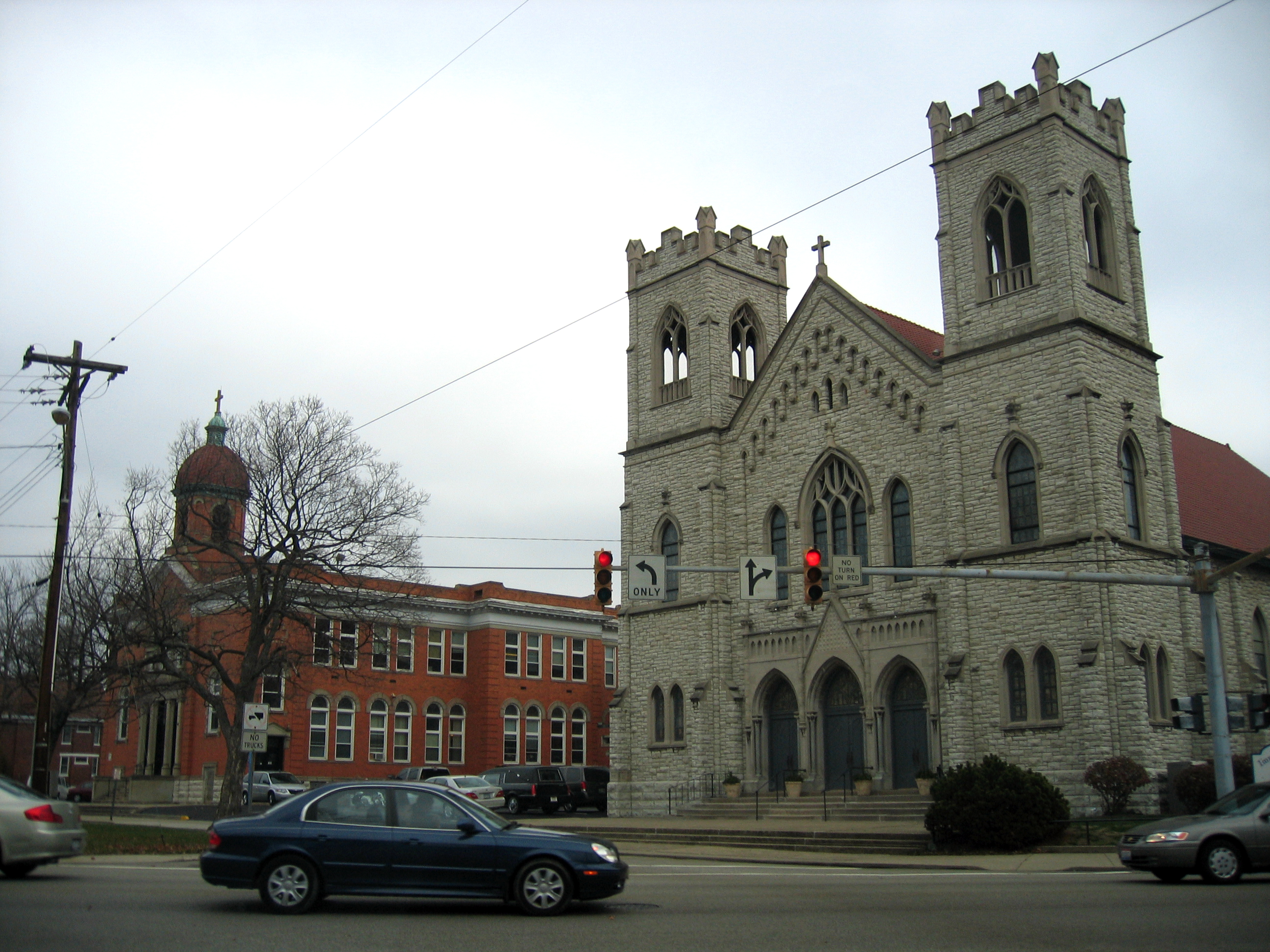 The former St. Matthew church (now Immaculate Conception church) in Norwood, Ohio. The brick building seen to the left of the church is the former Gressle School.