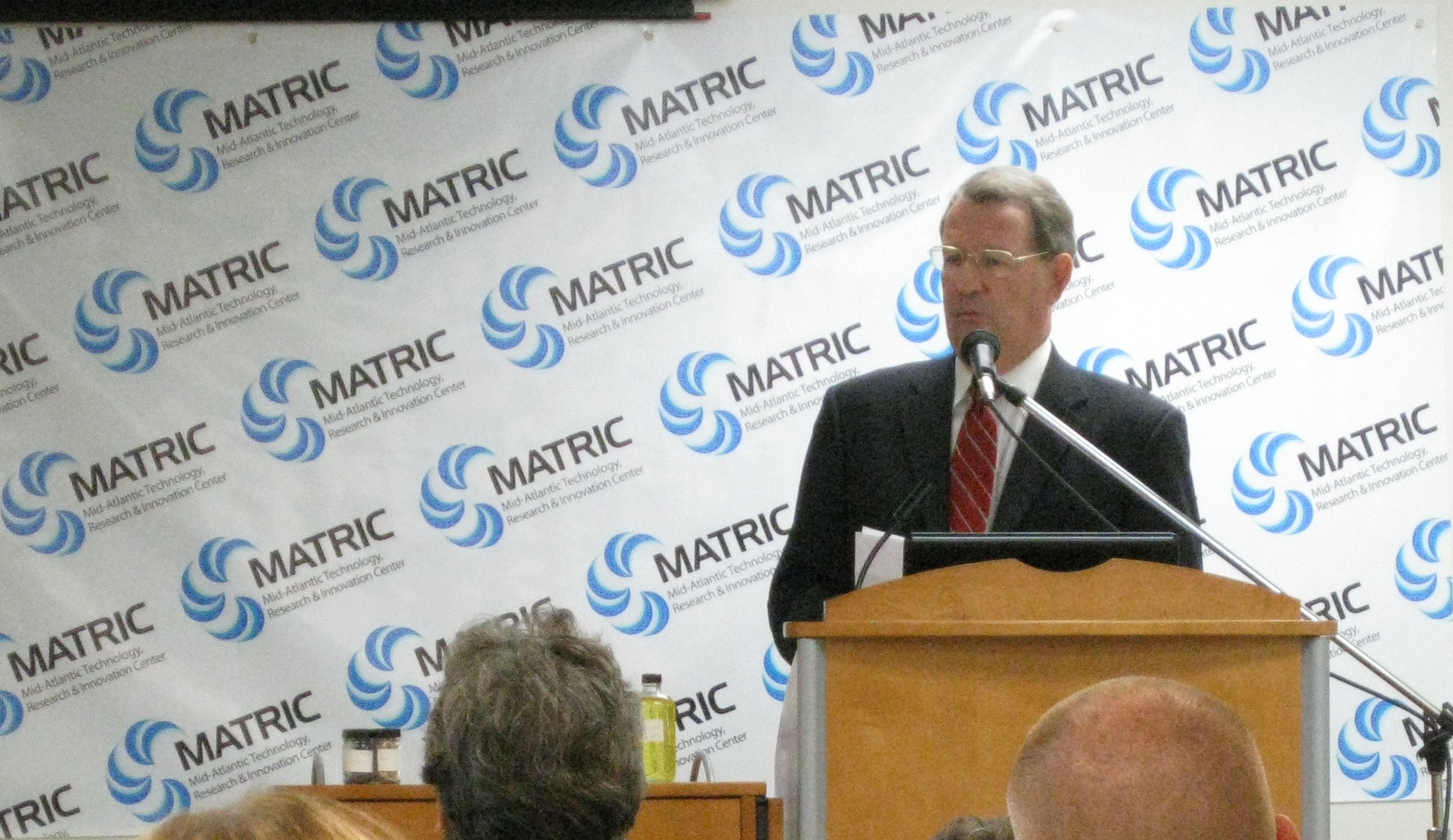 MATRIC Chairman of the Board of Directors, Paul. E. Arbogast, addresses the audience at a recent public meeting.