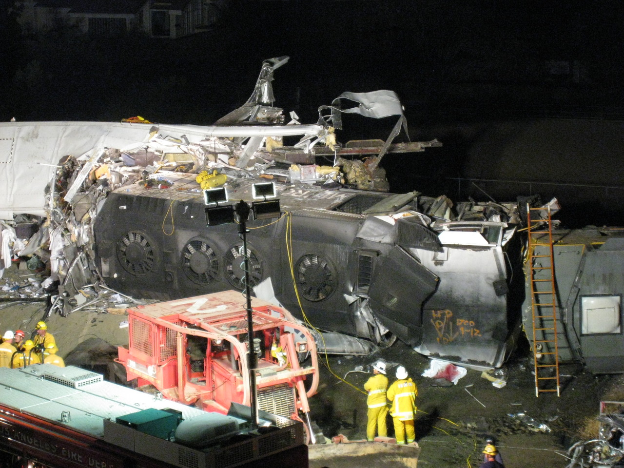 The Metrolink locomotive on its side after the collision.