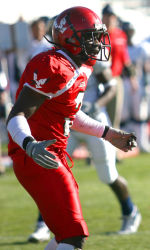 Ford talks with Isaiah Trufant during a game vs. University of Montana.