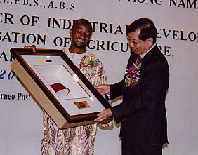 Mr.Anthony Claret exchanging Souvenirs