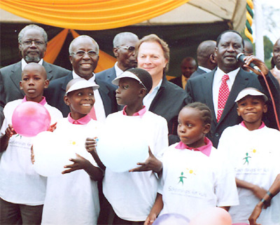 Scholarships for Kids' founder and CEO Paul Norman with Prime Minister Raila Odinga and Minister for Education Sam Ongeri at the SFK launch event in Nairobi.