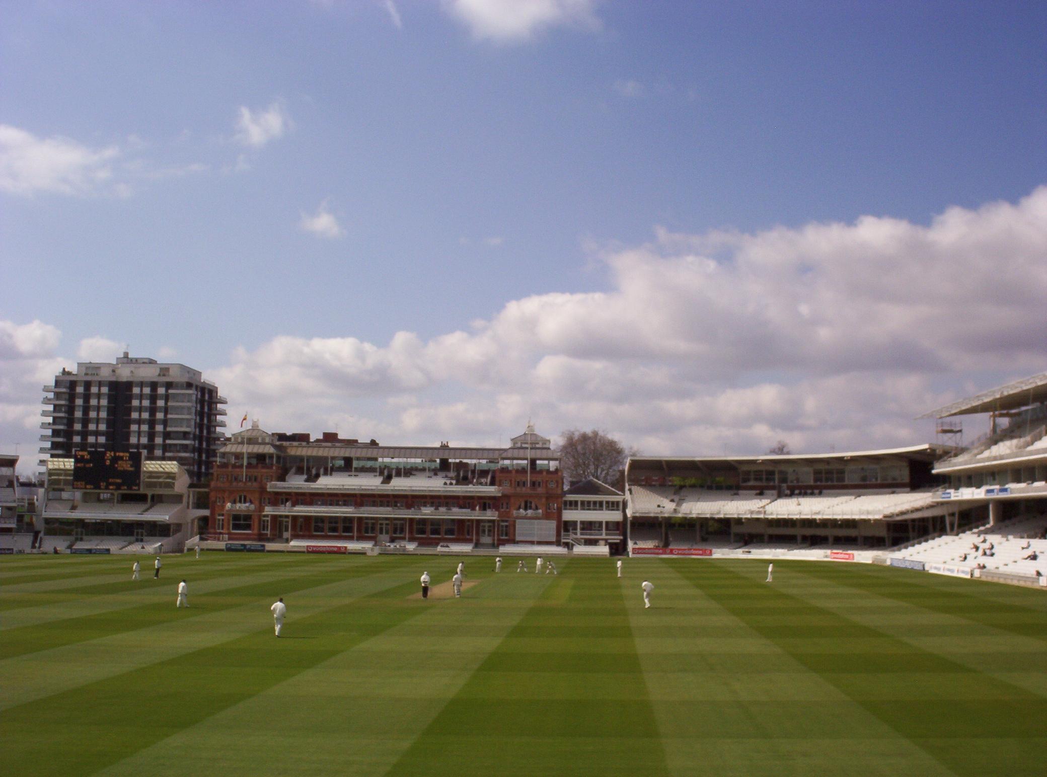 Heath Streak of Warwickshire about to bowl to Cook on 10 April.