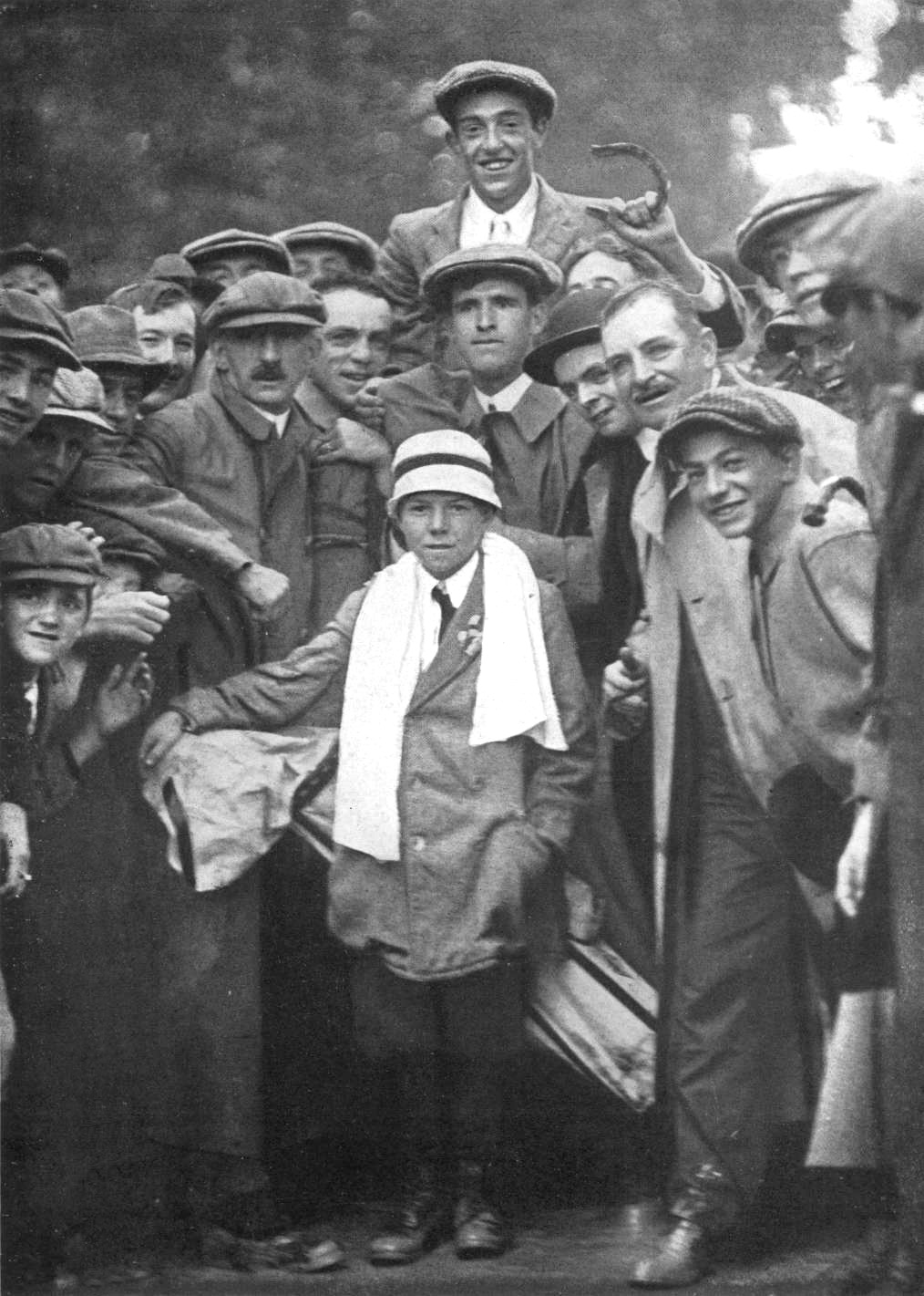 Winning in 1913; Eddie Lowery (his 10-year-old caddy) is in front