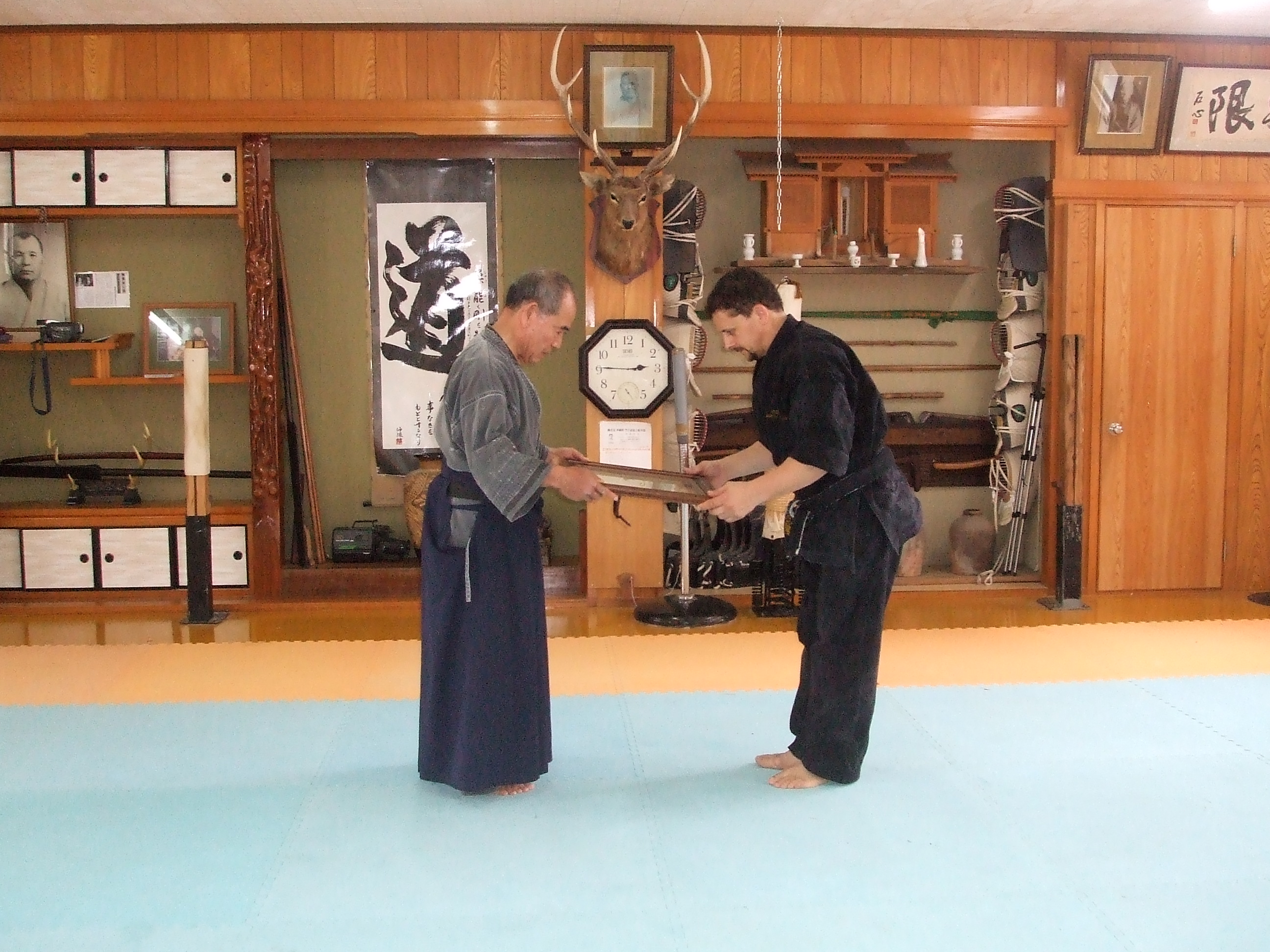Hanshi Ian Pollet receiving his 5th Dan In Okinawan Weapons (Ryūkyū Kobujutsu).