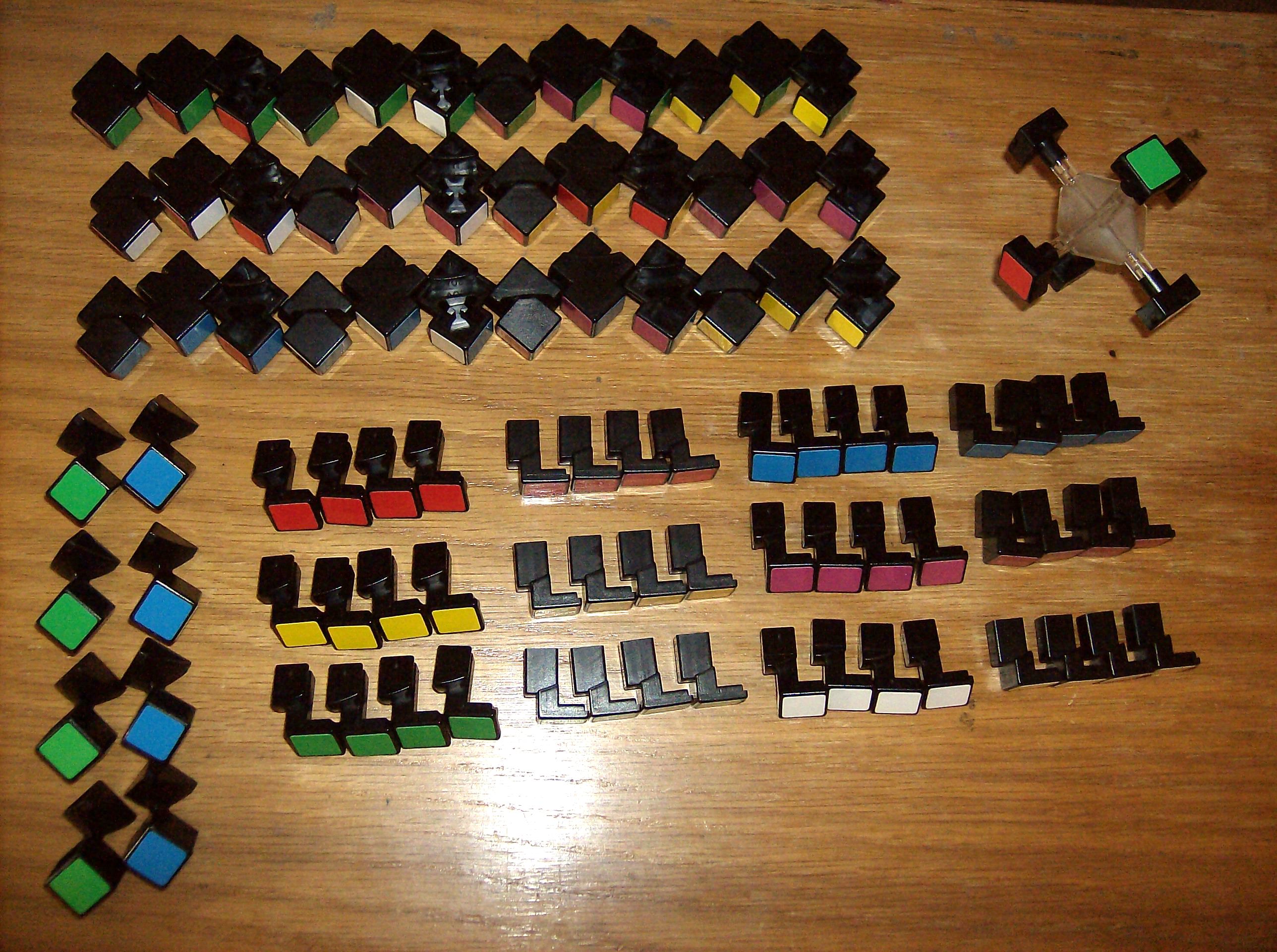A disassembled Eastsheen 5x5x5 cube.