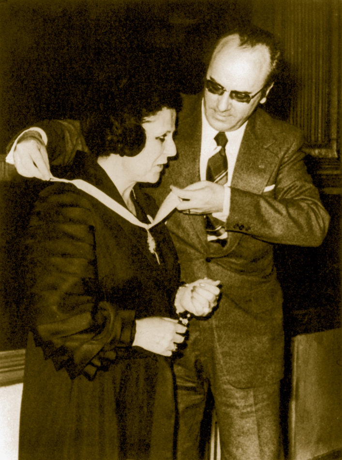 She was awarded with the "Charity Cross" by the Spanish Government.