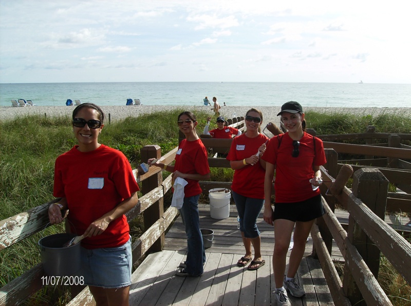  Hands On Miami volunteers painting the Miami Beach Boardwalk as part of Hands On Miami Day 2008.