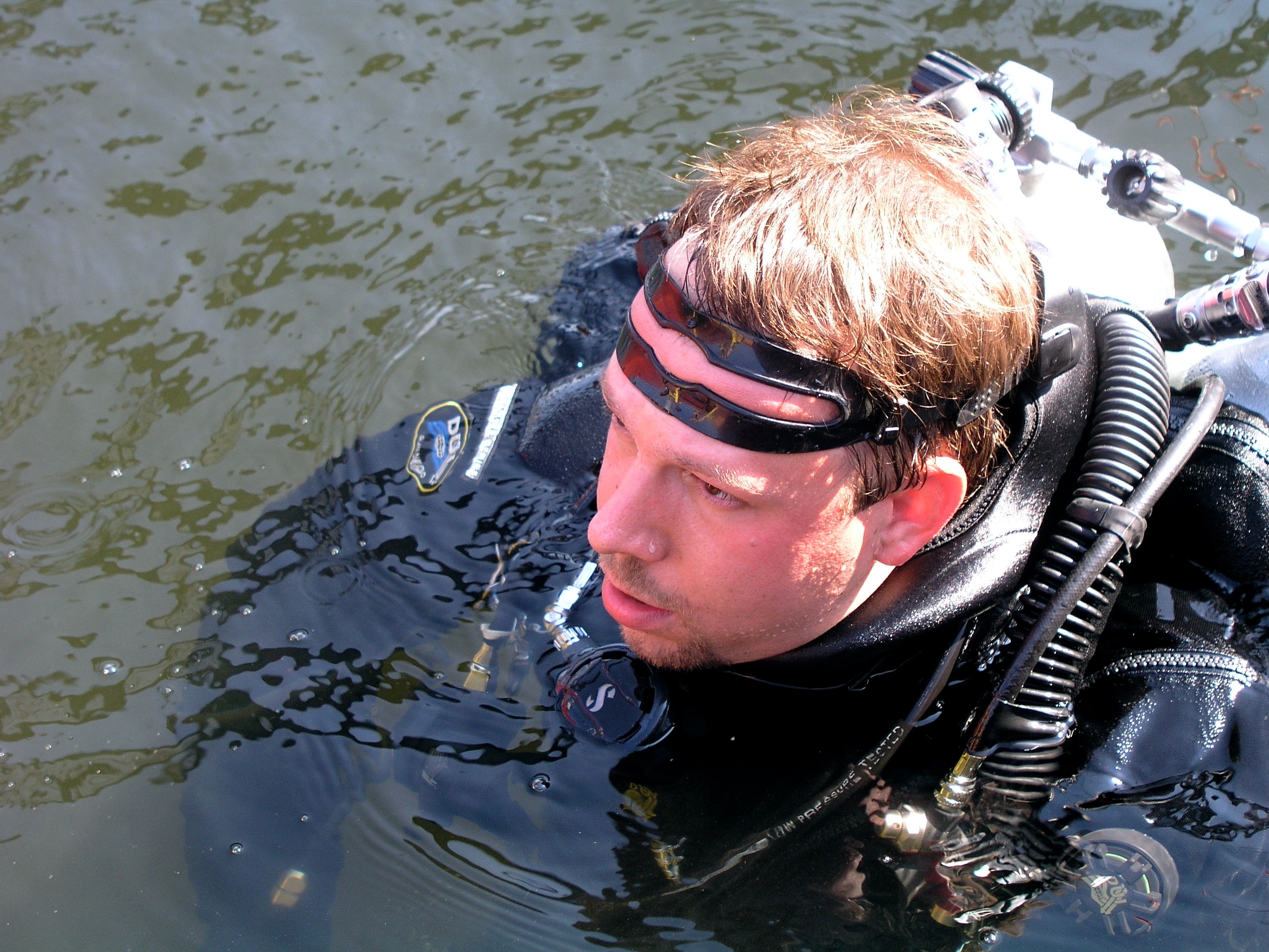 Brian Armstrong surfaces following dive to recover a B-25c from Lake Murray, SC in 2005