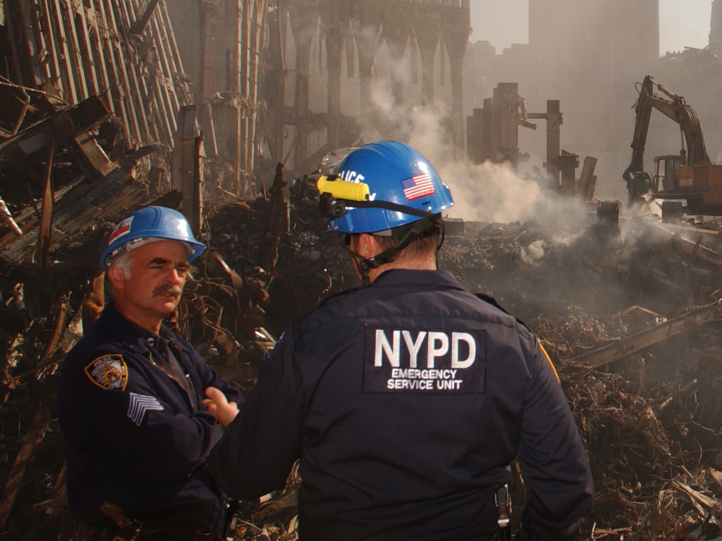 Two NYPD officers at the World Trade Center site five weeks after the attacks.