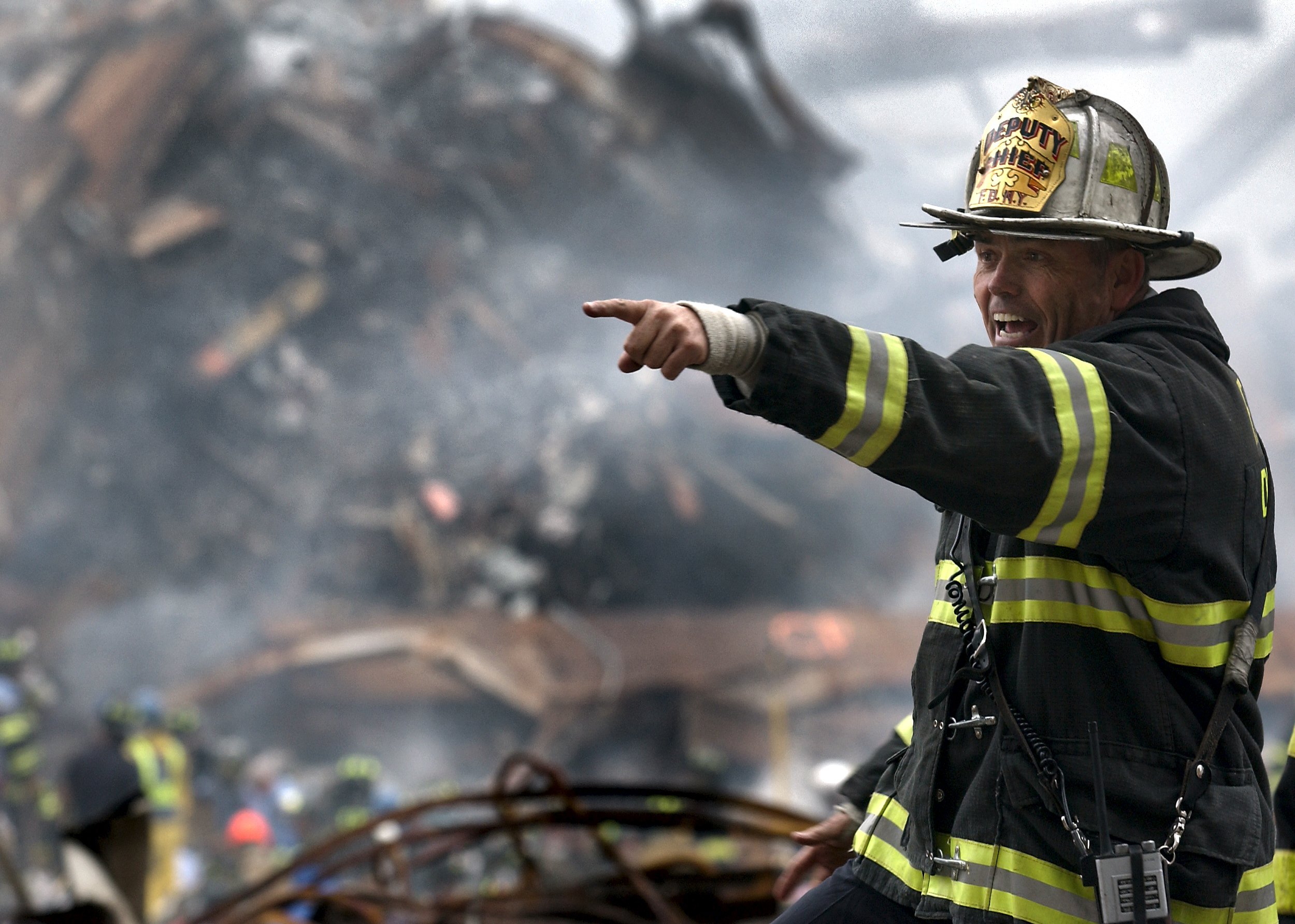 A deputy chief coordinates recovery efforts three days after the collapse of the World Trade Center. A deputy chief coordinates recovery efforts three days after the collapse of the World Trade Center.