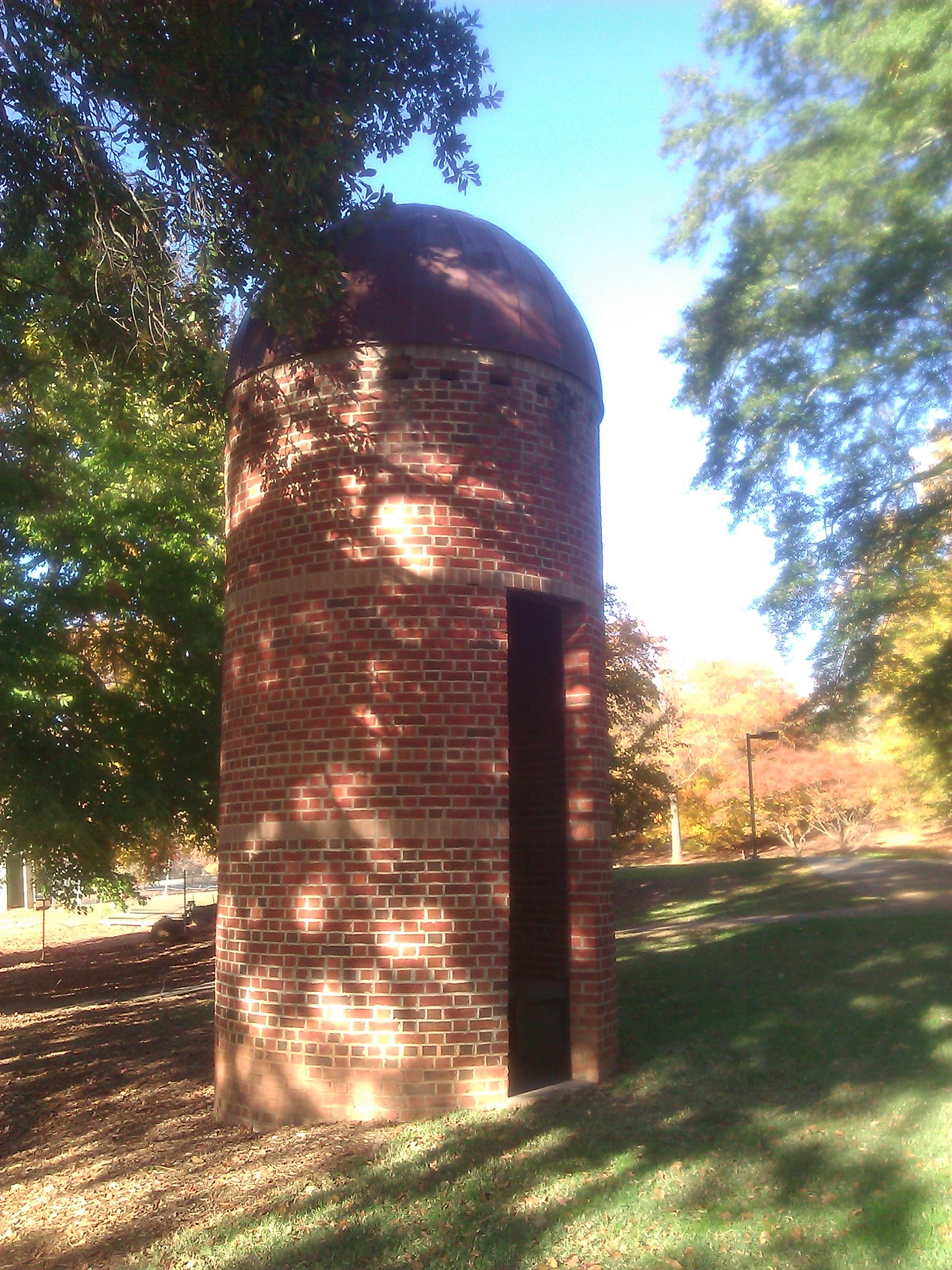 The brick structure is designed to blend in with surrounding buildings, concealing the clue to the next part of the art