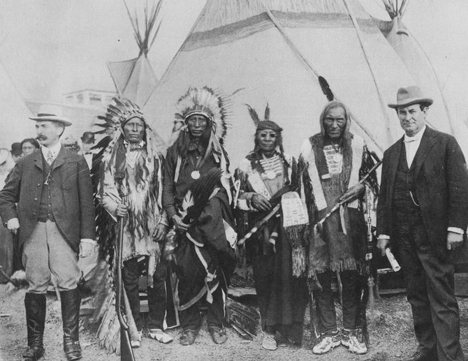  Left to right: F.T. Cummins, General Manager of the Exposition; High Hawk, Jack Red Cloud, Blue Horse, Little Wound and William Jennings Bryan. Pan-American Exposition of 1901.