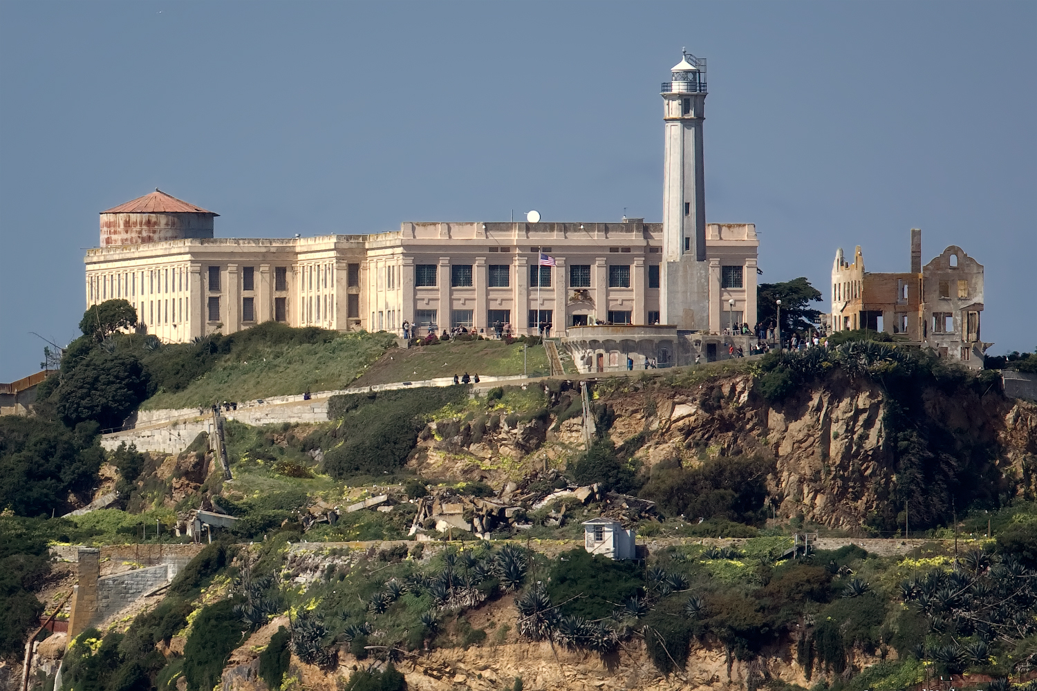 The Parade Grounds is the flat area at the bottom of the cliff which contains Alcatraz Island Light