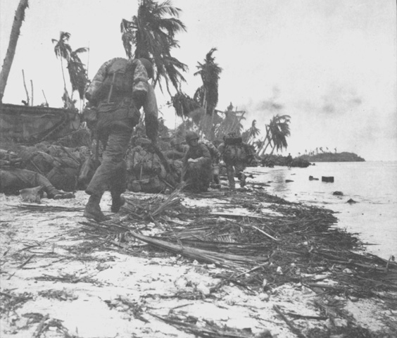 US Marines move inland in Guam.