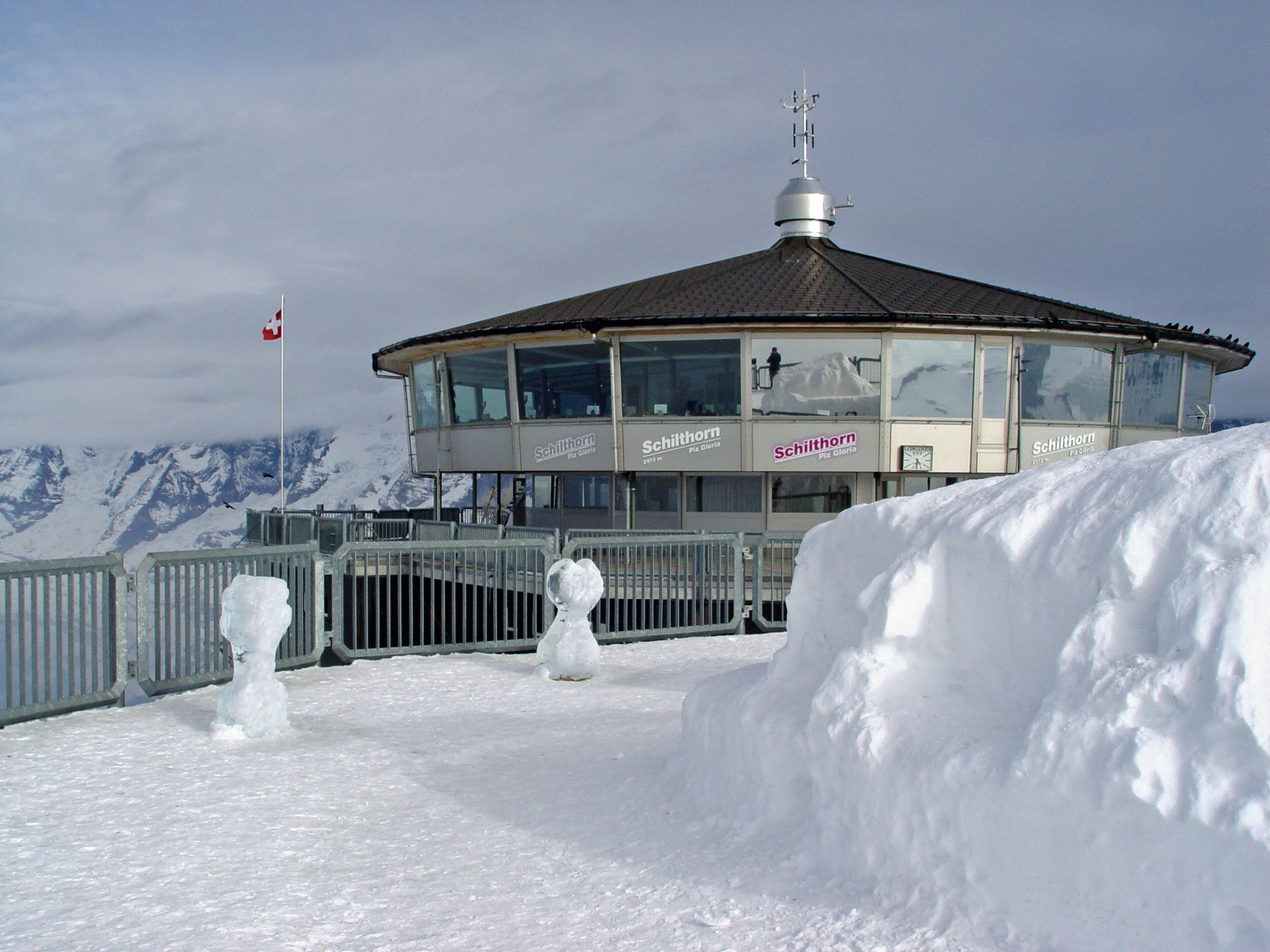 Piz Gloria, Switzerland.|alt=A restaurant in a snowy environment. Mountains can be seen in the background.