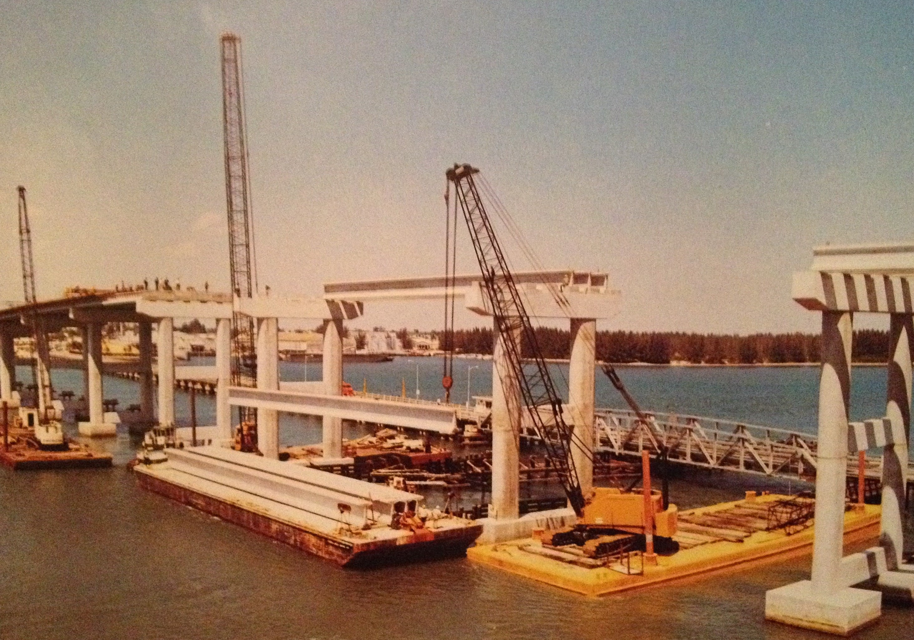 MOBRO barges and cranes building a bridge in Florida.