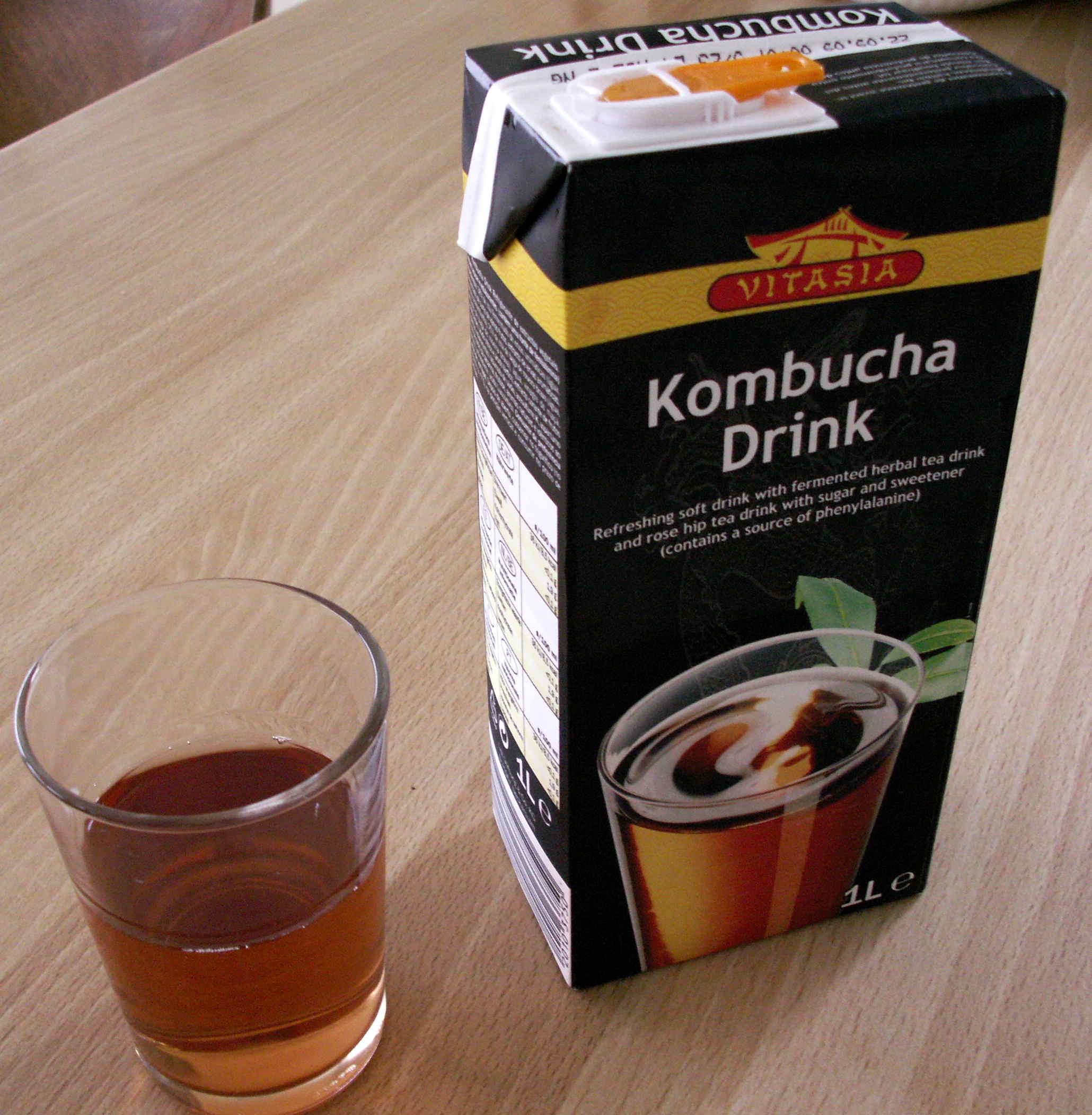 Export-oriented, non-traditional Kombucha that has been artificially reflavored for distribution