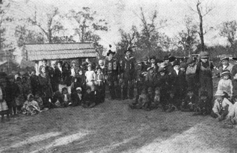 Keetoowah Nighthawk Society leaders Redbird Smith and Bluford Sixkiller instructing children in Cherokee rituals, 1921 Keetoowah Nighthawk Society leaders Redbird Smith and Bluford Sixkiller instructing children in Cherokee rituals, 1921