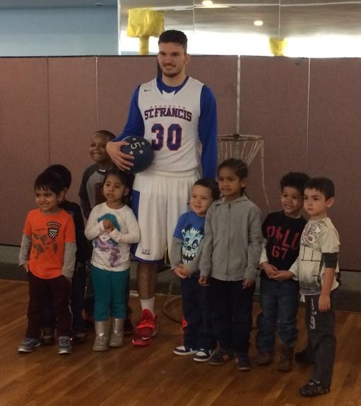  Edon Molla at the kids with disabilities clinic.