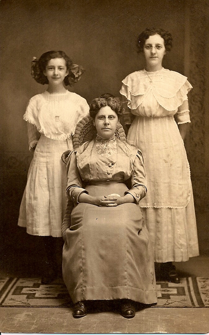  Fred J. Strain's wife, Bertha Marie Jarmin Strain (sitting) and daughters Pearl (right) and Hazel (left).