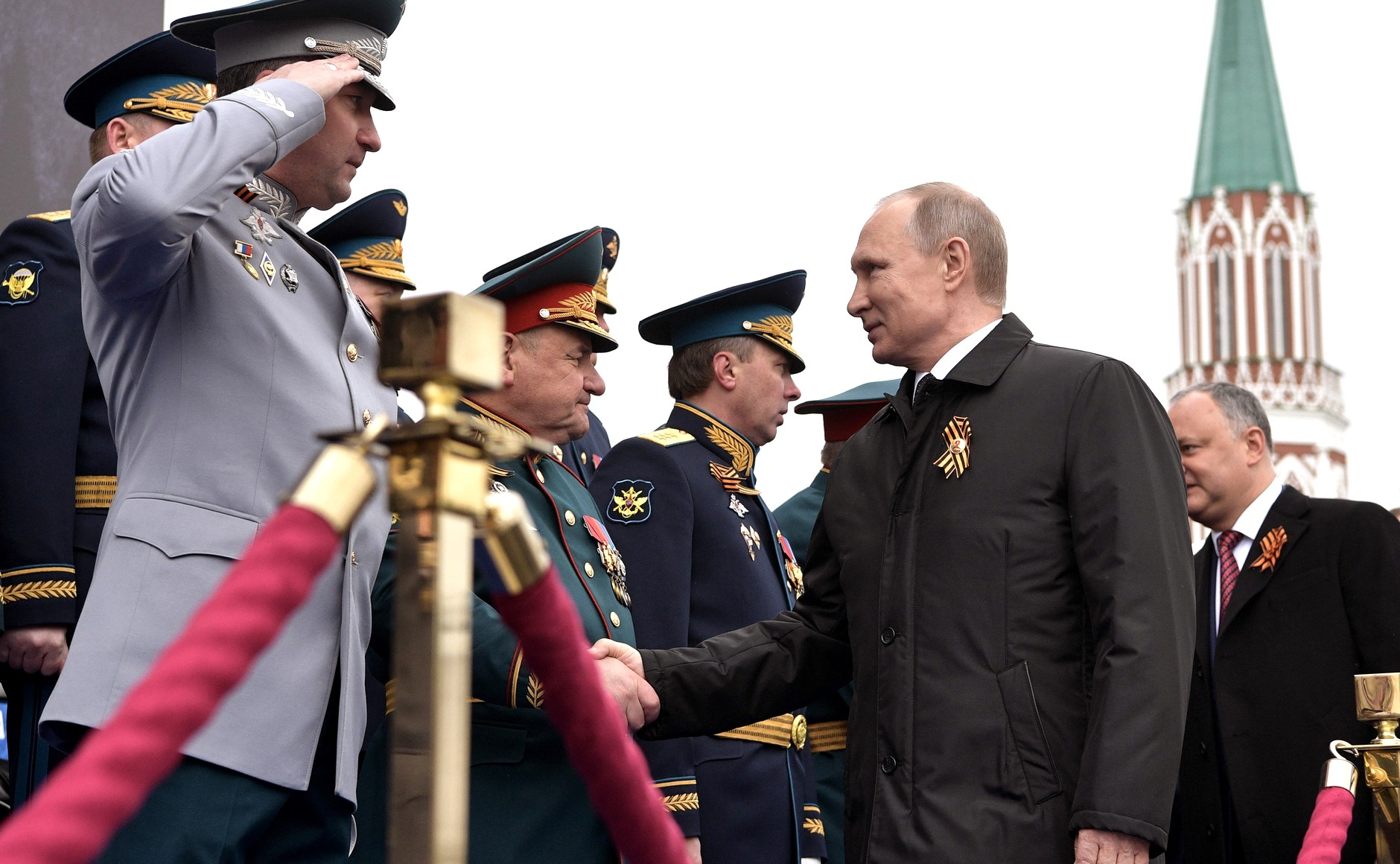 President Putin and President Dodon greeting veterans.