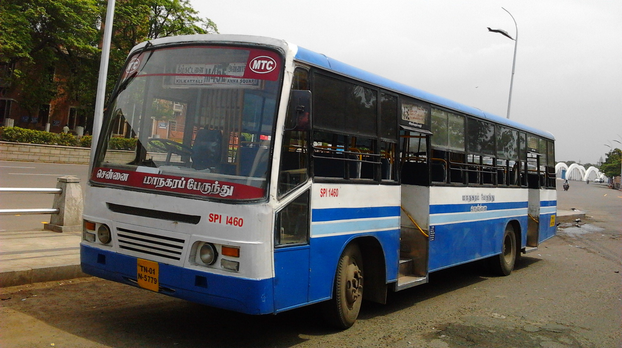 An ordinary fare (white board) bus