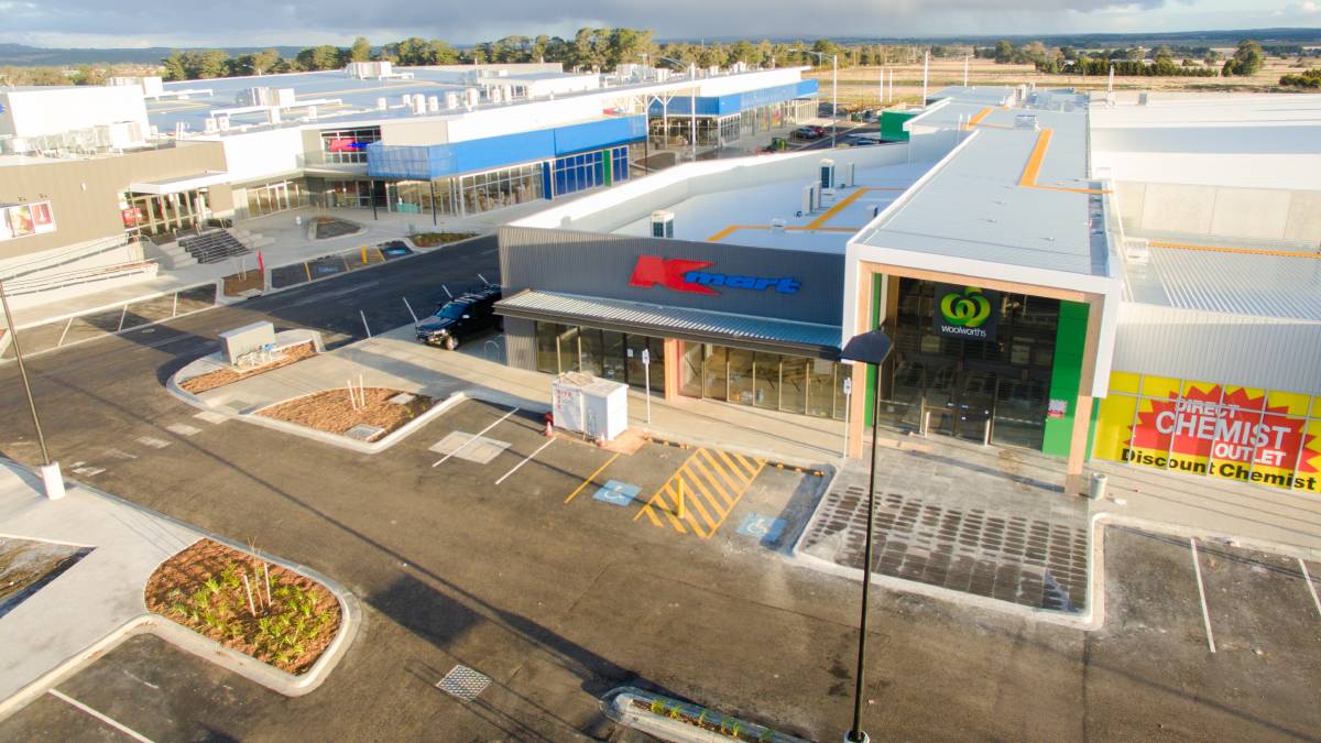This is an aerial view of the Delacombe Town Centre on the 29th of August 2017. It shows Woolworths, Kmart and Direct Chemist Outlet.