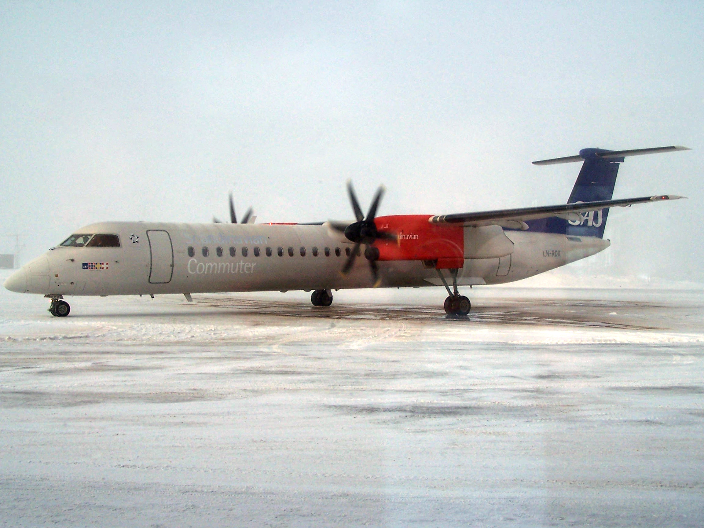 A Bombardier Q400 aircraft of Scandinavnian Commuter Swelink at Växjö-Kronoberg Airport, Sweden