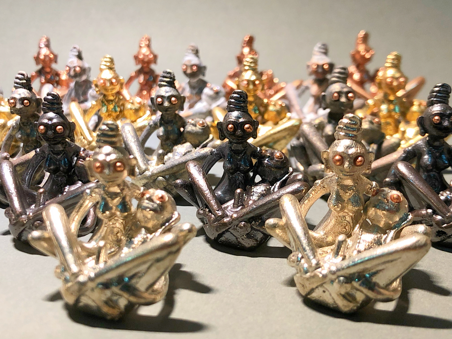Mass-produced Thai fertility talismans sold under the name "iPher/ePher". 