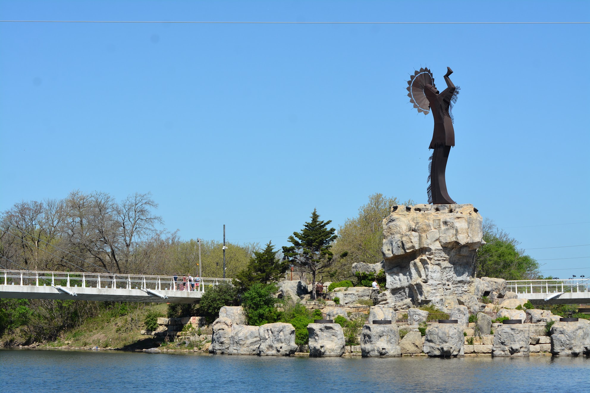 Erected for the United States Bicentennial, the Keeper of the Plains serves as a central civic landmark at the junction of the Arkansas and Little Arkansas rivers.