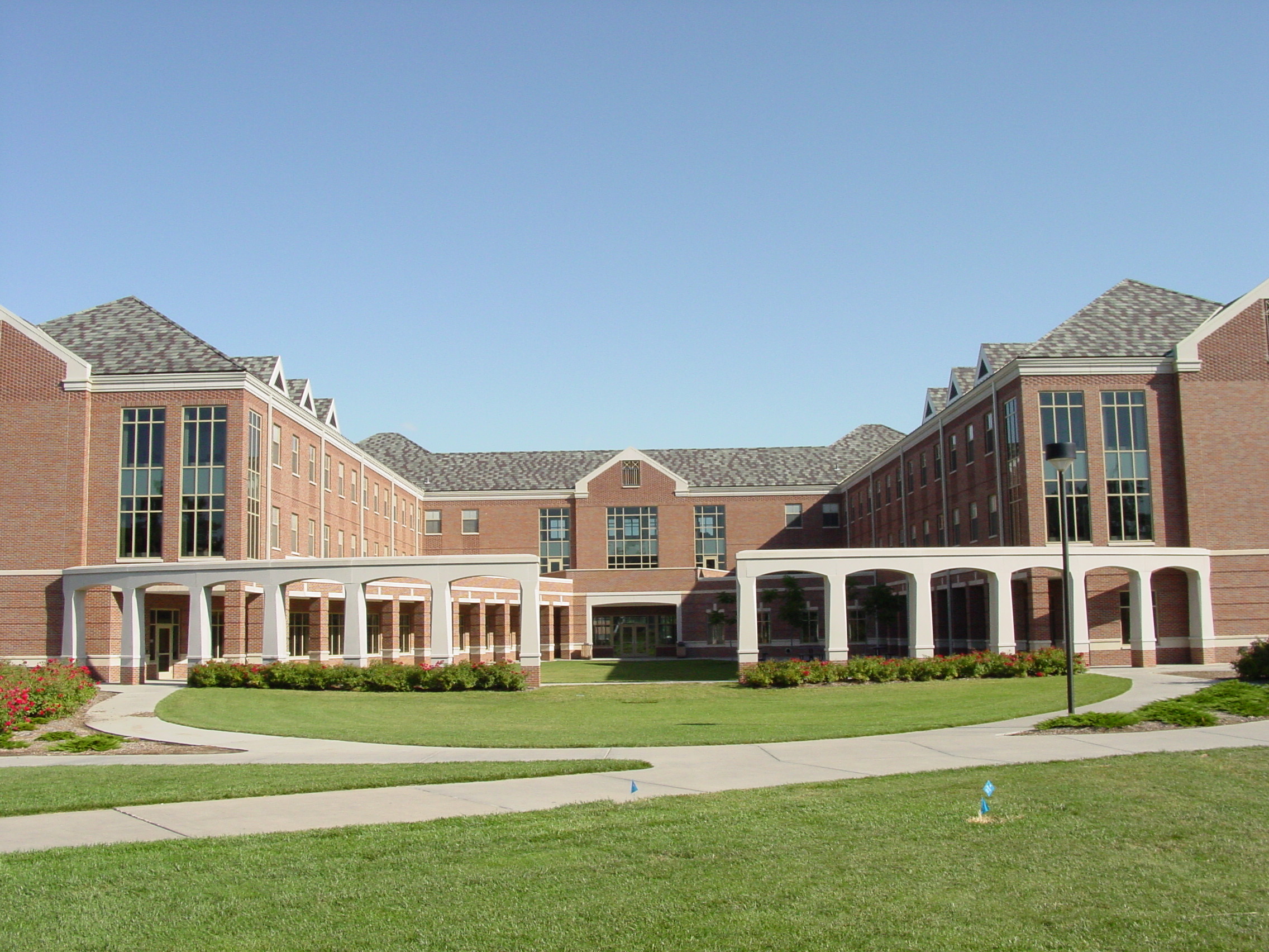 The south side of the Esther L. Kauffman Academic Residential Center, looking north from the Student Union